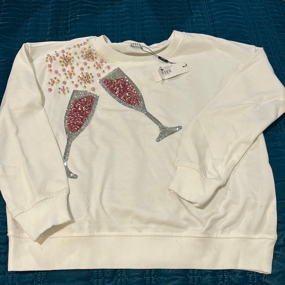 Never worn. Champagne sequin long sleeve shirt